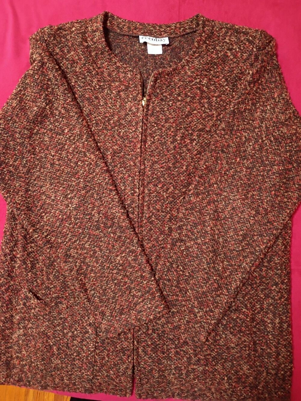 This Eccobay cardigan sweater features a textured, multi-colored tweed knit with